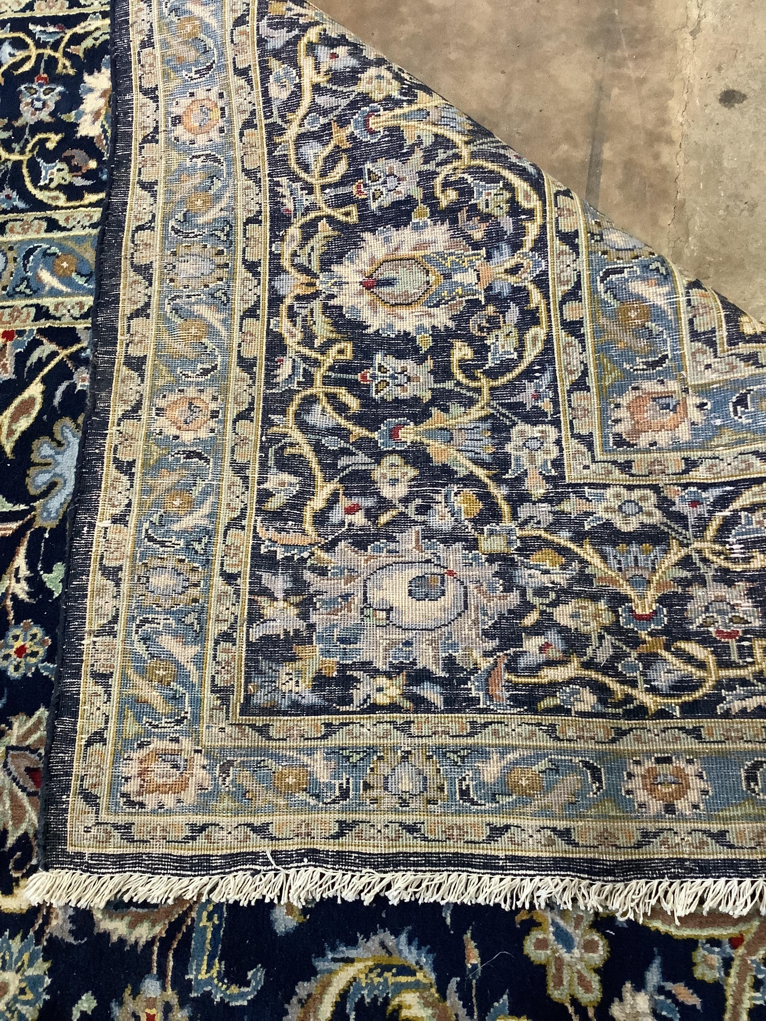 A North West Persian blue ground carpet, 344 x 276cm